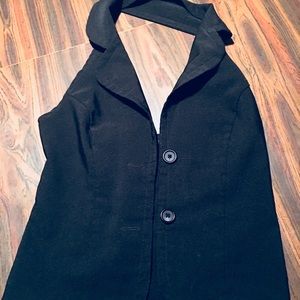 Black fitted style vest